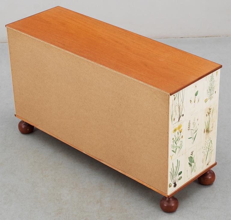 A Josef Frank chest of drawers, 'Flora' by Svenskt Tenn, model 1050.