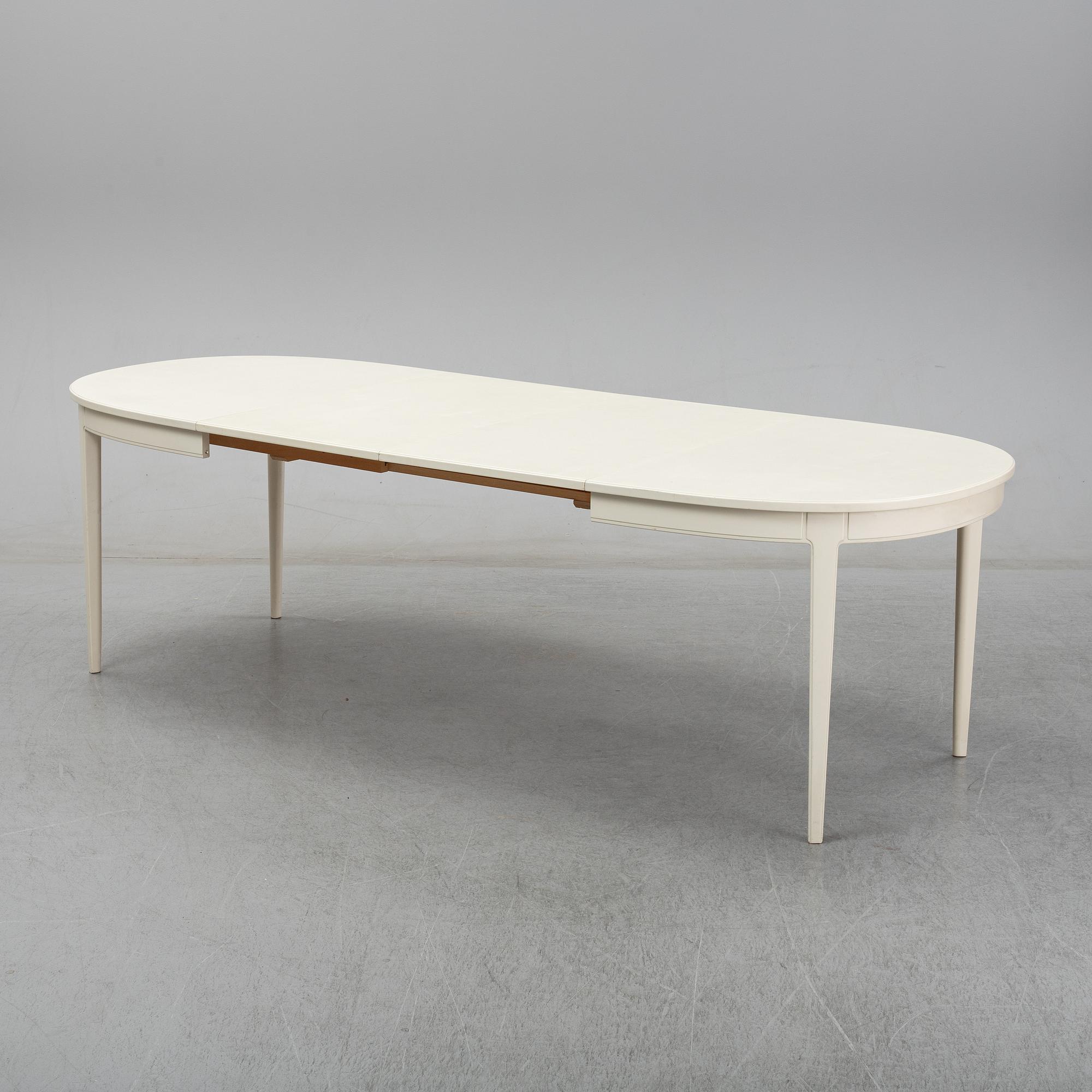 Carl Malmsten, A dining table with four chairs, Bodafors 1960's.