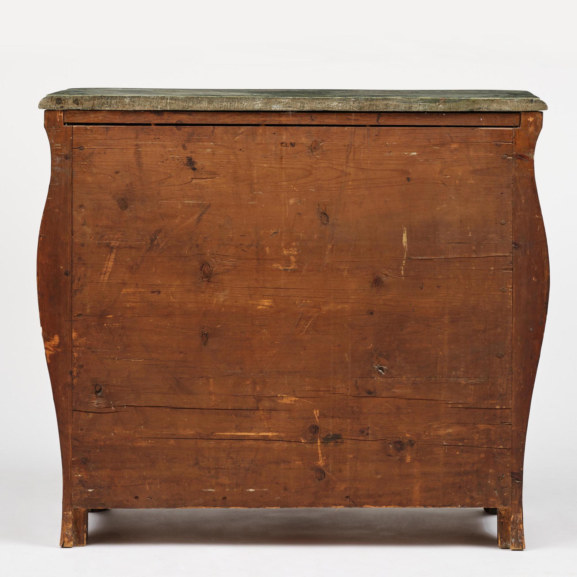 A Swedish rococo parquetry commode by C. Linning (master in Stockholm 1744-79).