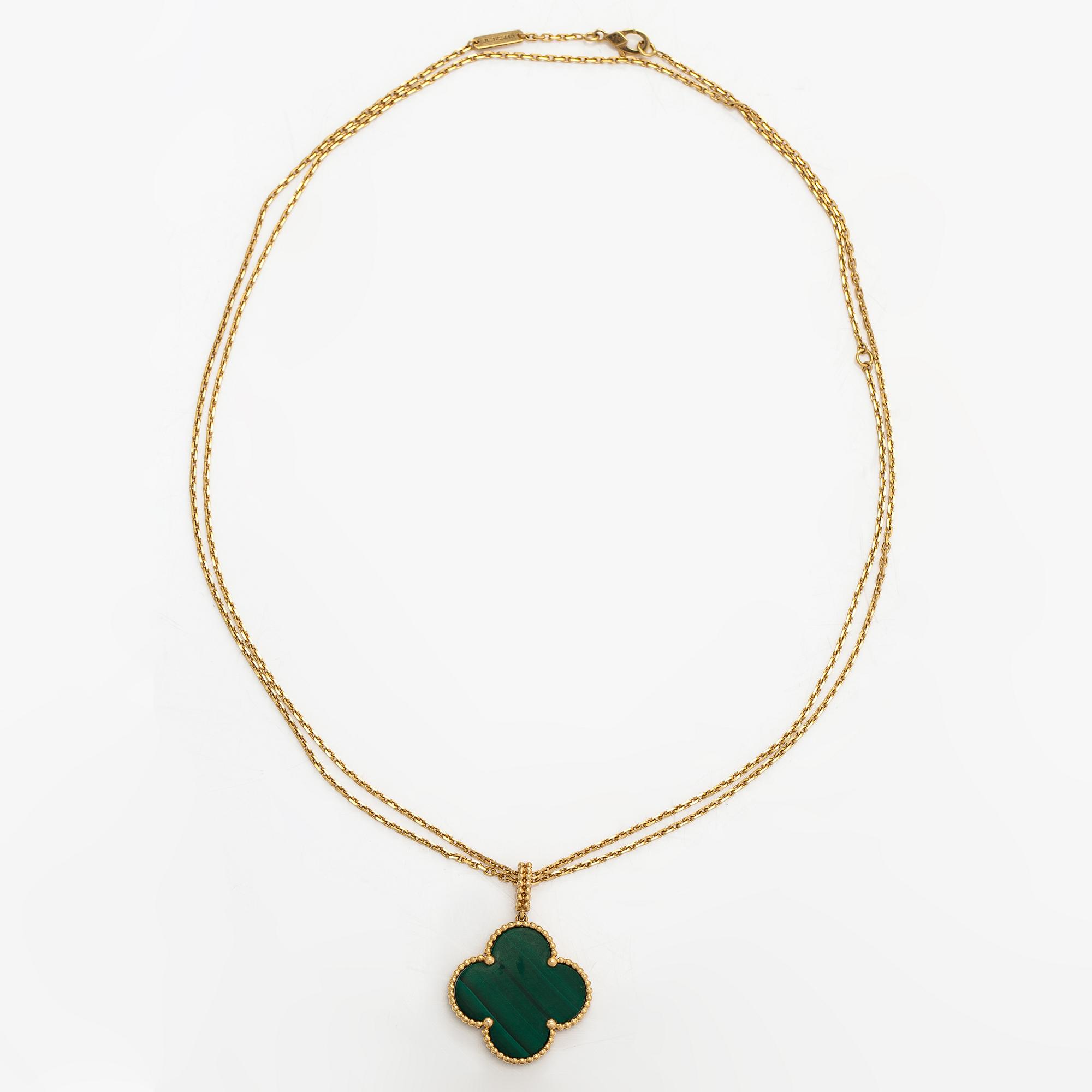 Van Cleef & Arpels, An 18K gold and malachite "Magic Alhambra" necklace. Marked VCA, JE472415.