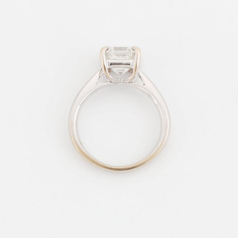 An 18K white gold ring set with an Asscher-cut diamond.