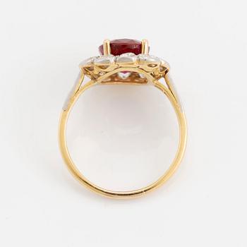 An 18K gold and platinum ring set with a faceted ruby weight ca 3.35 cts.