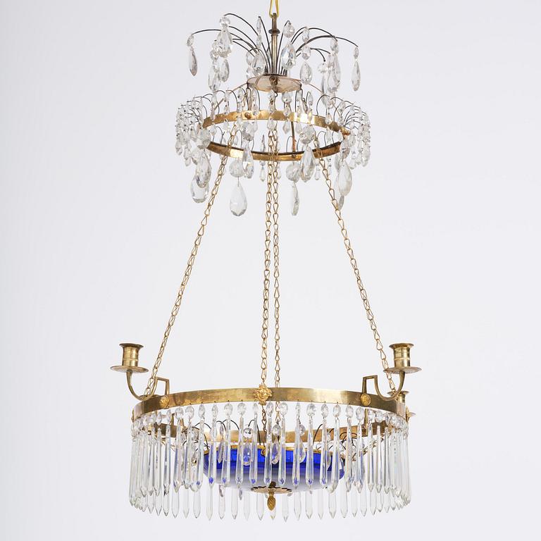 A late Gustavian five-light gilt brass and cut glass chandelier, Stockholm, late 18th century.