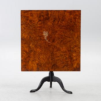 A tilt-top table, around 1800.
