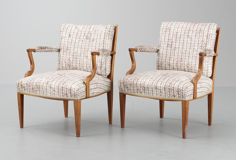 A pair of Josef Frank mahogany and rattan easy chairs, nr 969, by Firma Svenskt Tenn.