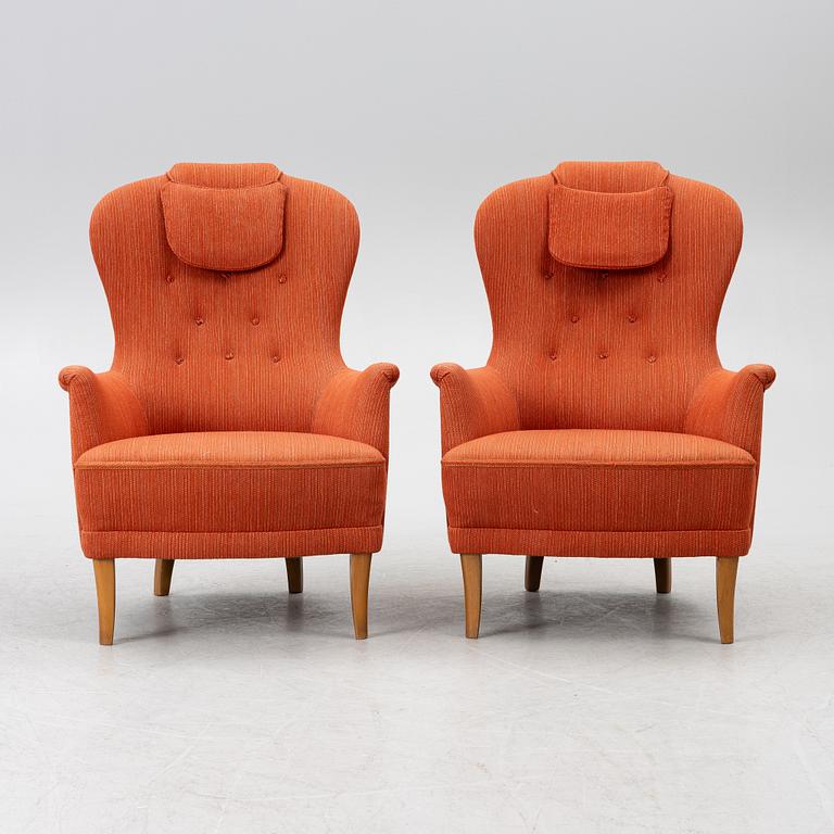 Carl Malmsten, a pair of "Farmor" armchairs, O.H.Sjögren, Sweden, later part of the 20th century.