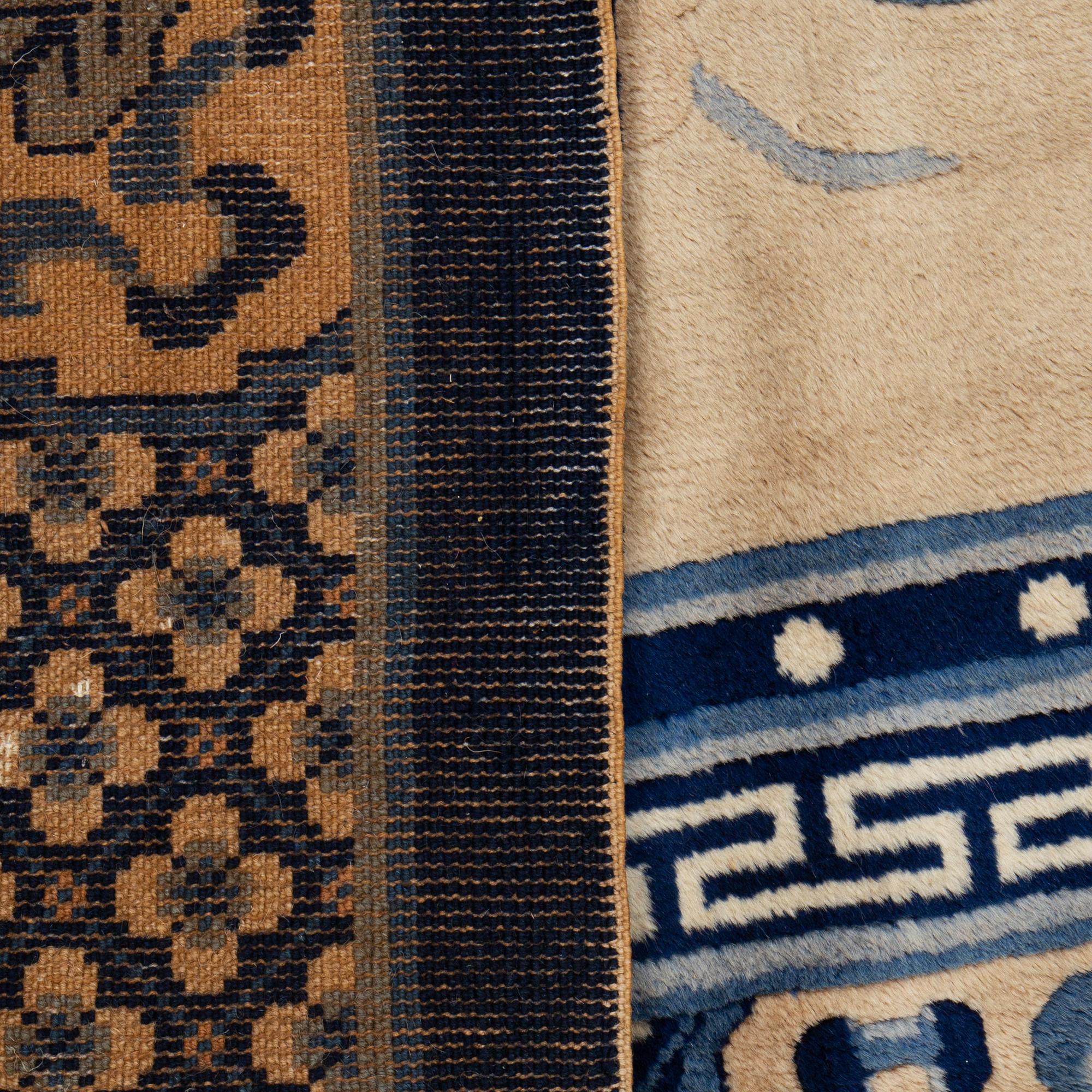 A Carpet, old China, "antique finish" ca 197 x 133 cm.