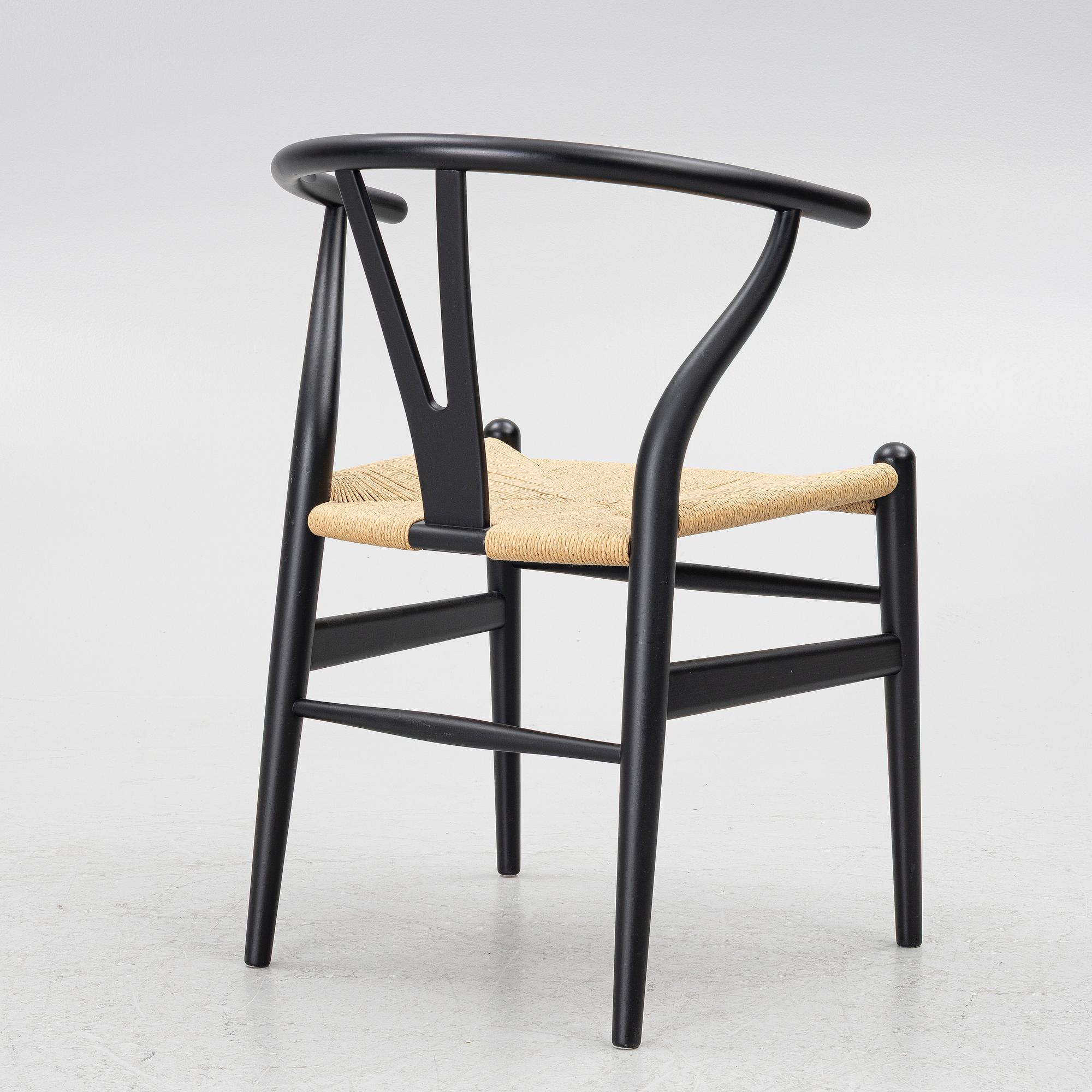 Hans J. Wegner, a model CH-24/'Wishbone' chair, Carl Hansen, Denmark, 21st century.