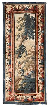 272. A tapestry, "Verdure", tapestry weave, a so called "entre-fenêtre", ca 295-296 x 126-129,5 cm, signed M.R.DABVSON.i.D.