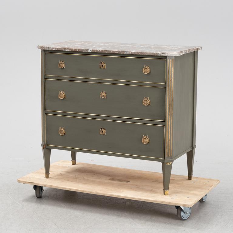 A late gustavian style chest of drawers, first half of the 20th Century.