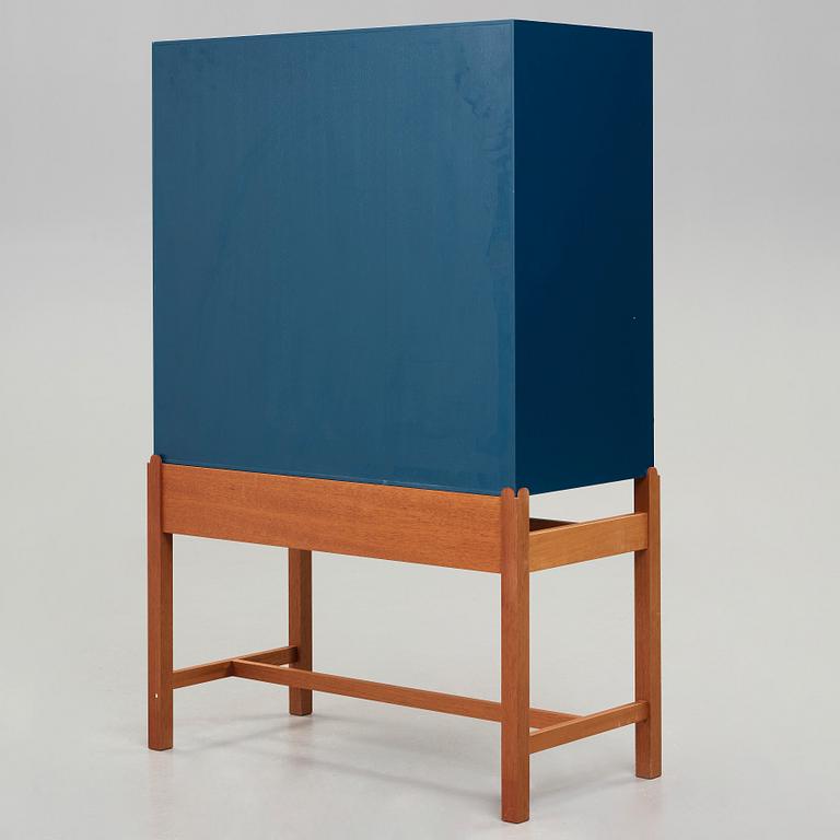 Josef Frank, a blue lacquered cabinet on stand, model nr 2192, by Svenskt Tenn, Sweden.