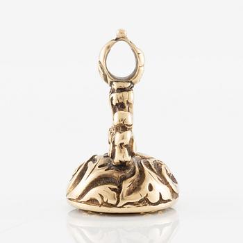 Sigill 14K guld och graverad gulaktig sten, möjligen citrin.