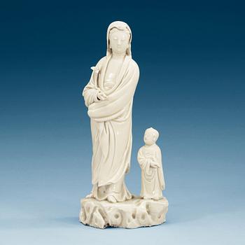 A blanc de chine figure of Guanyin with an attendant, Qing dynasty, 18th Century.