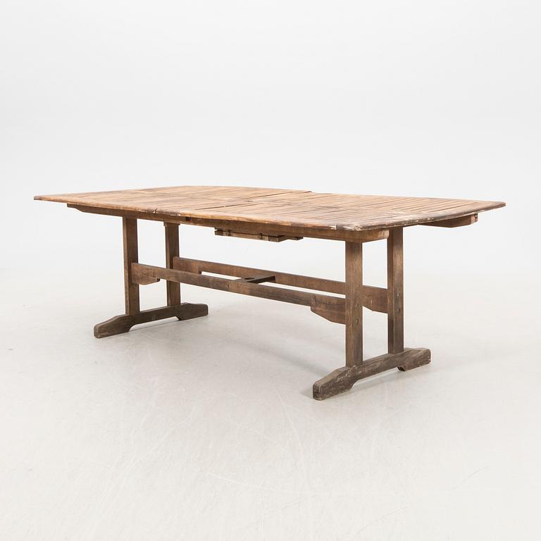 A 9 pcs stained teak garden suite by Brafab around 2000.