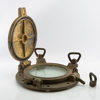 Vent / ship's window, dated 1966.