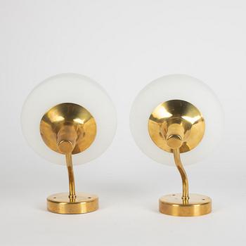 Harald Notini, a pair of model "8721" wall lamps, Arvid Böhlmarks Lampfabrik, Sweden, 1950's.