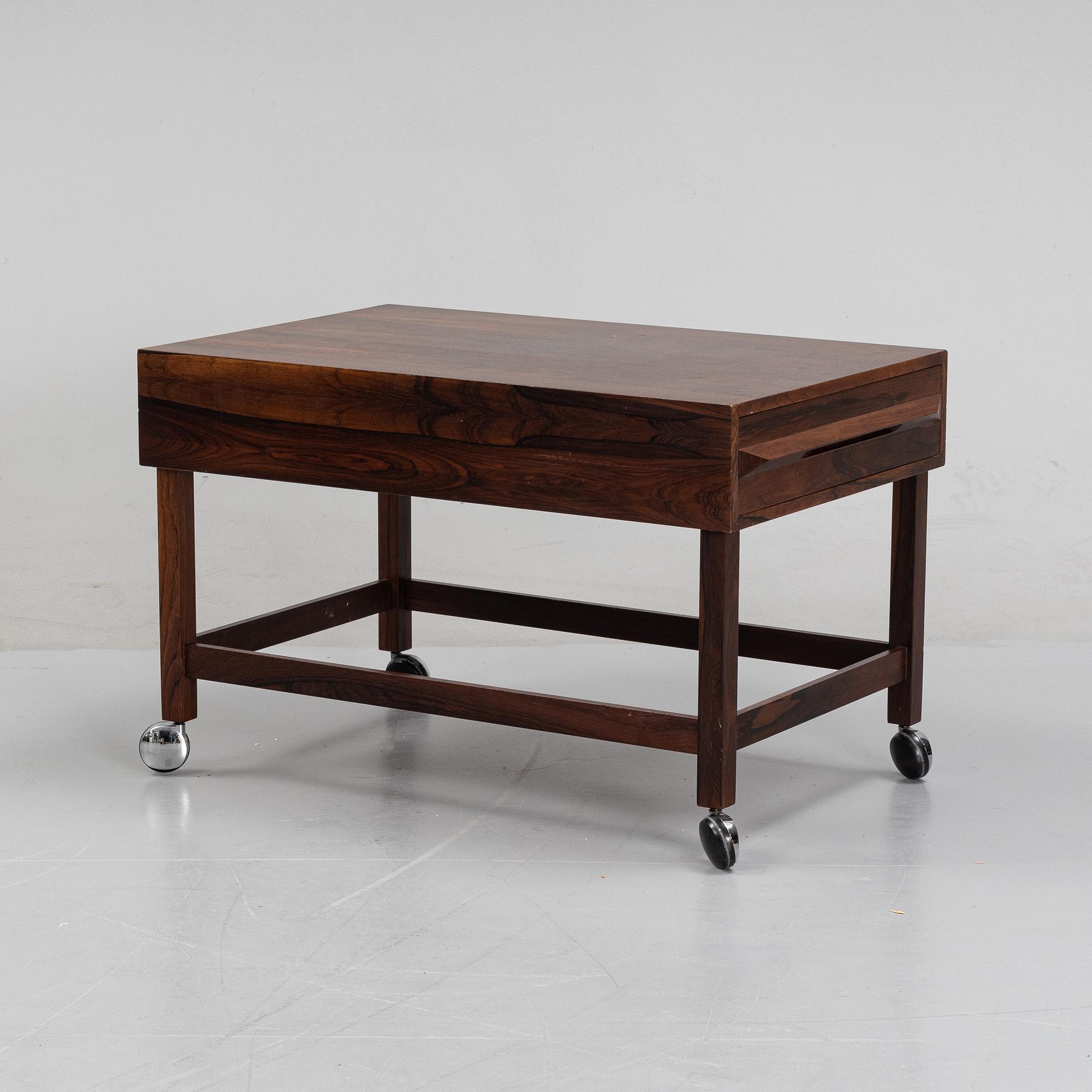 Torbjörn afdal, a rosewood serving trolley/coffee table, Bagn Möbelindustri, Norway, 1970's.