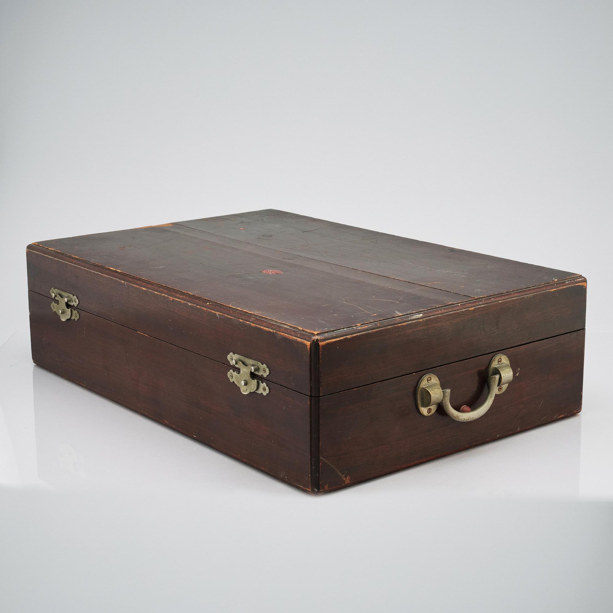 A box with a Japanese silver tea and coffee service by A box with a Japanese silver tea and coffee service by