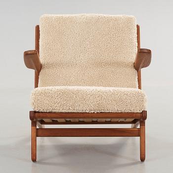 Børge Mogensen, an oak and iron easy chair, Fredericia, Denmark 1950's.