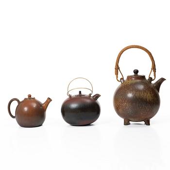 Gösta Grähs, , Gunnar Nylund and Carl-Harry Stålhane, three stoneware teapots, Rörstrand.