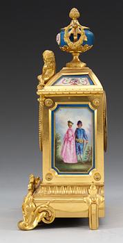 A French 19th cent mantel clock, marked "Sèvres" and signed "S.W.Lom".