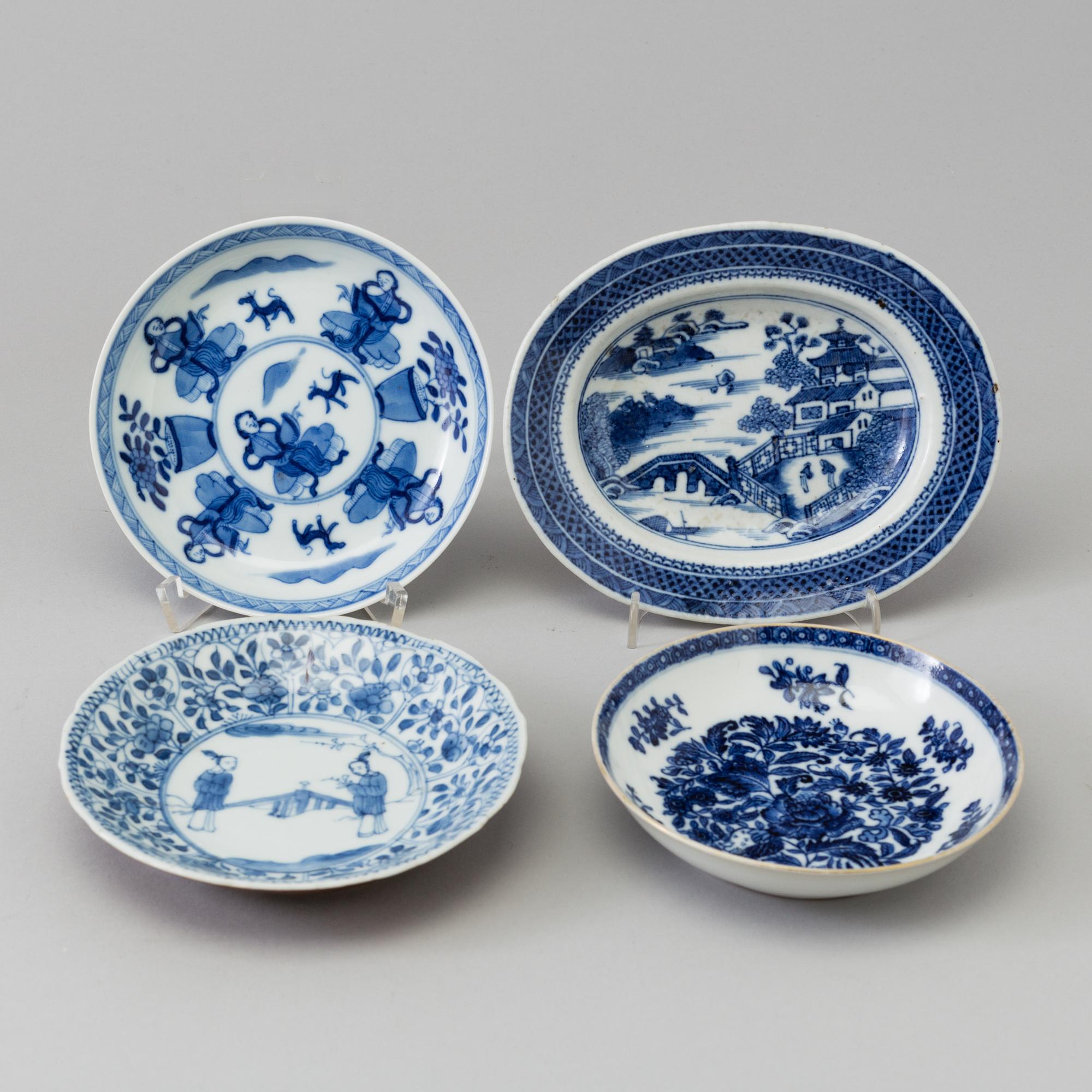 Four blue and white porcelain dishes, Qing dynasty.