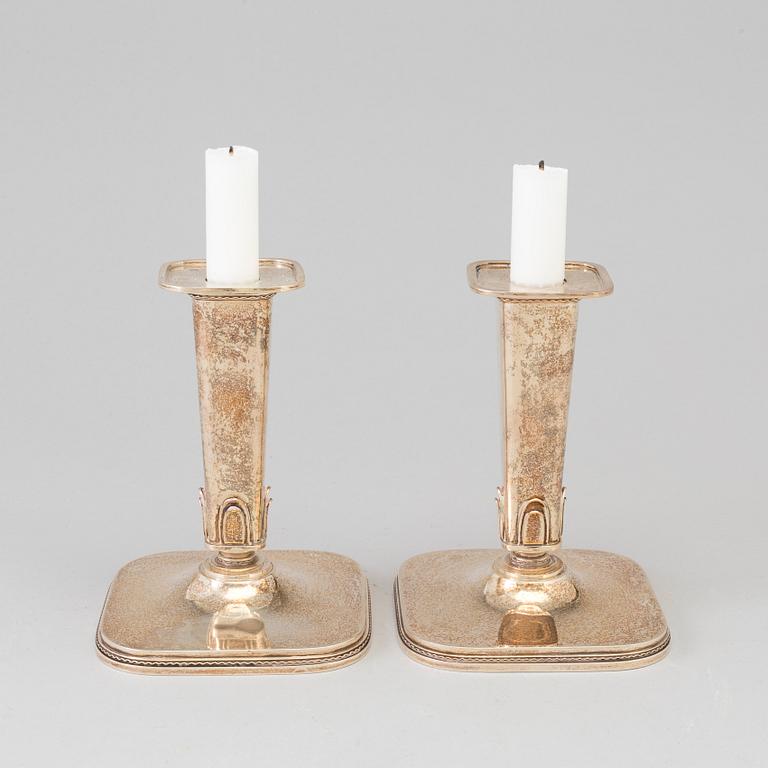 A pair of steling silver candlesticks by Atelier Borgila, Stockholm, 1951.