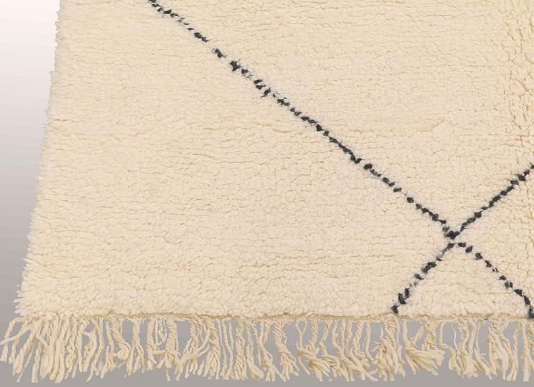 A moroccan rug, 330 x 262 cm.