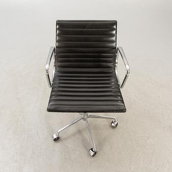 A Charles and Ray Eames "EA 117" office chair from ICF Milano.