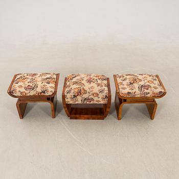 A pair of stools and an Art Deco from the first half of the 20th century.