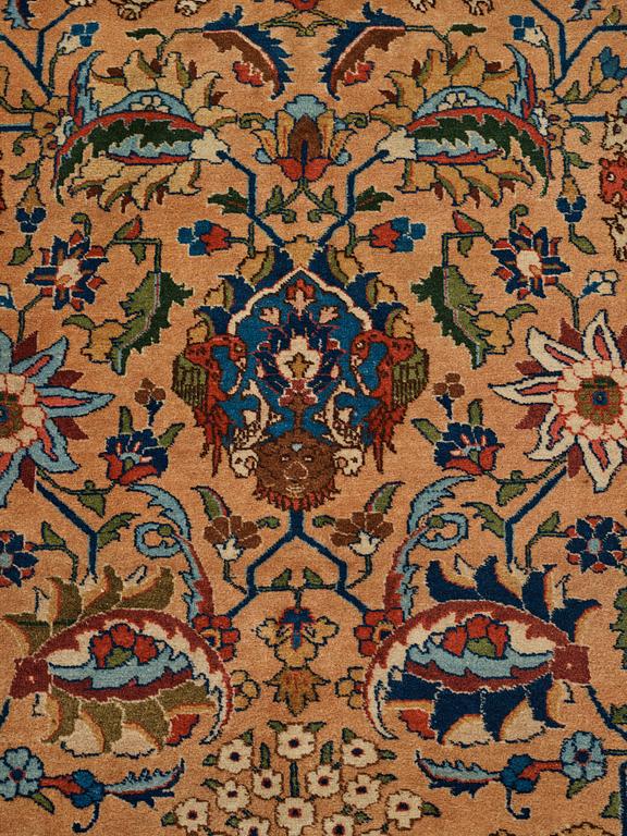 A carpet, semi-antique Tabriz, ca 404 x 292 cm.