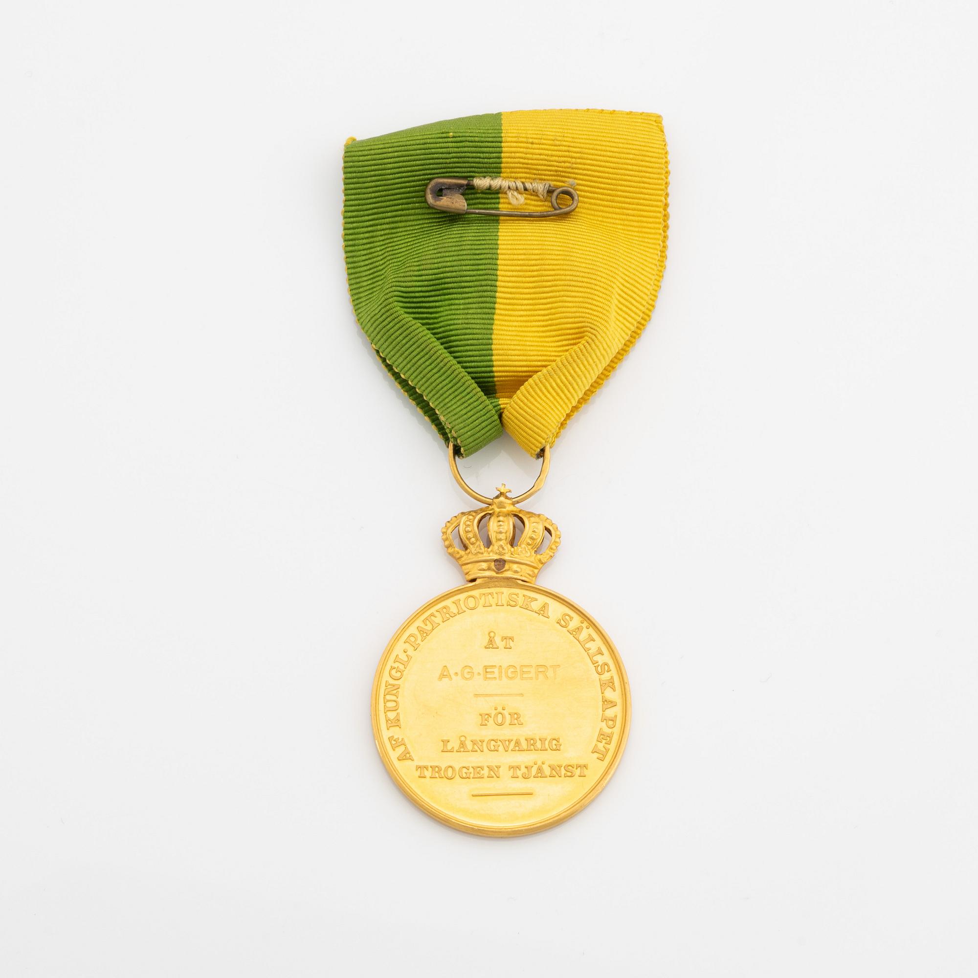A Swedish 18 ct gold medal.