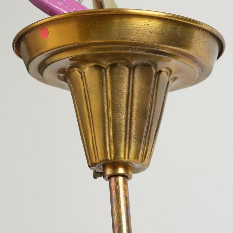Swedish Grace, a brass and glass lamp, 1920s-40s.