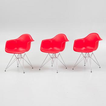 Charles & Ray Eames, a set of three 'Plastic Armchair DAR', Vitra, 2010.