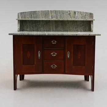 KOMMOD, 1900-talets första hälft.