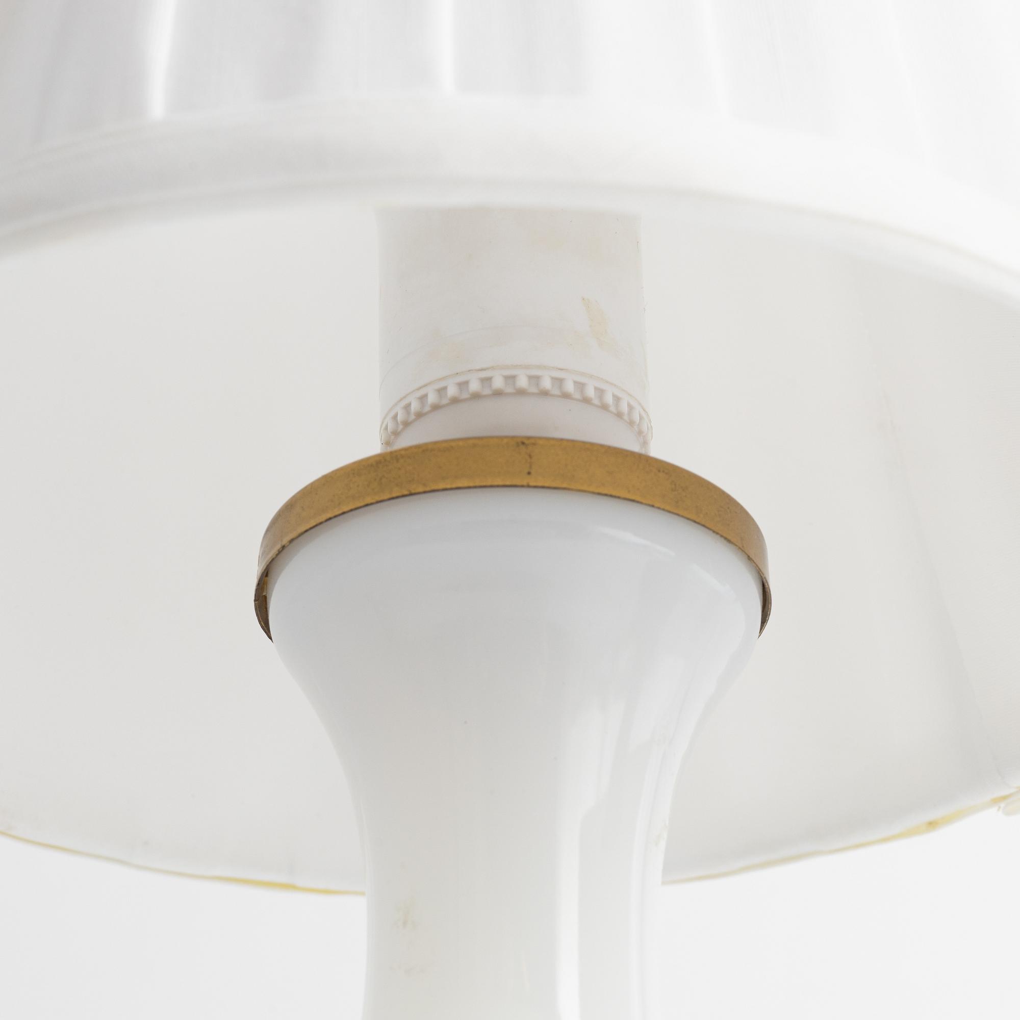 A pair of similar glass table lights from Lindshammars glasbruk, probably designed by Gunnar Ander.