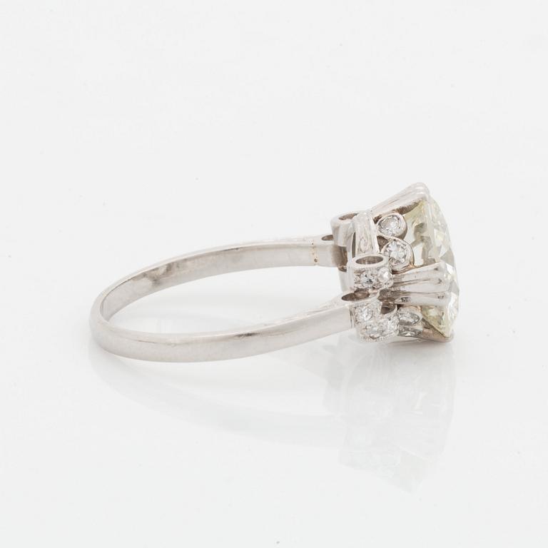 A platinum ring set with an old-cut diamond weight ca 3.00 cts quality ca J/K vs.