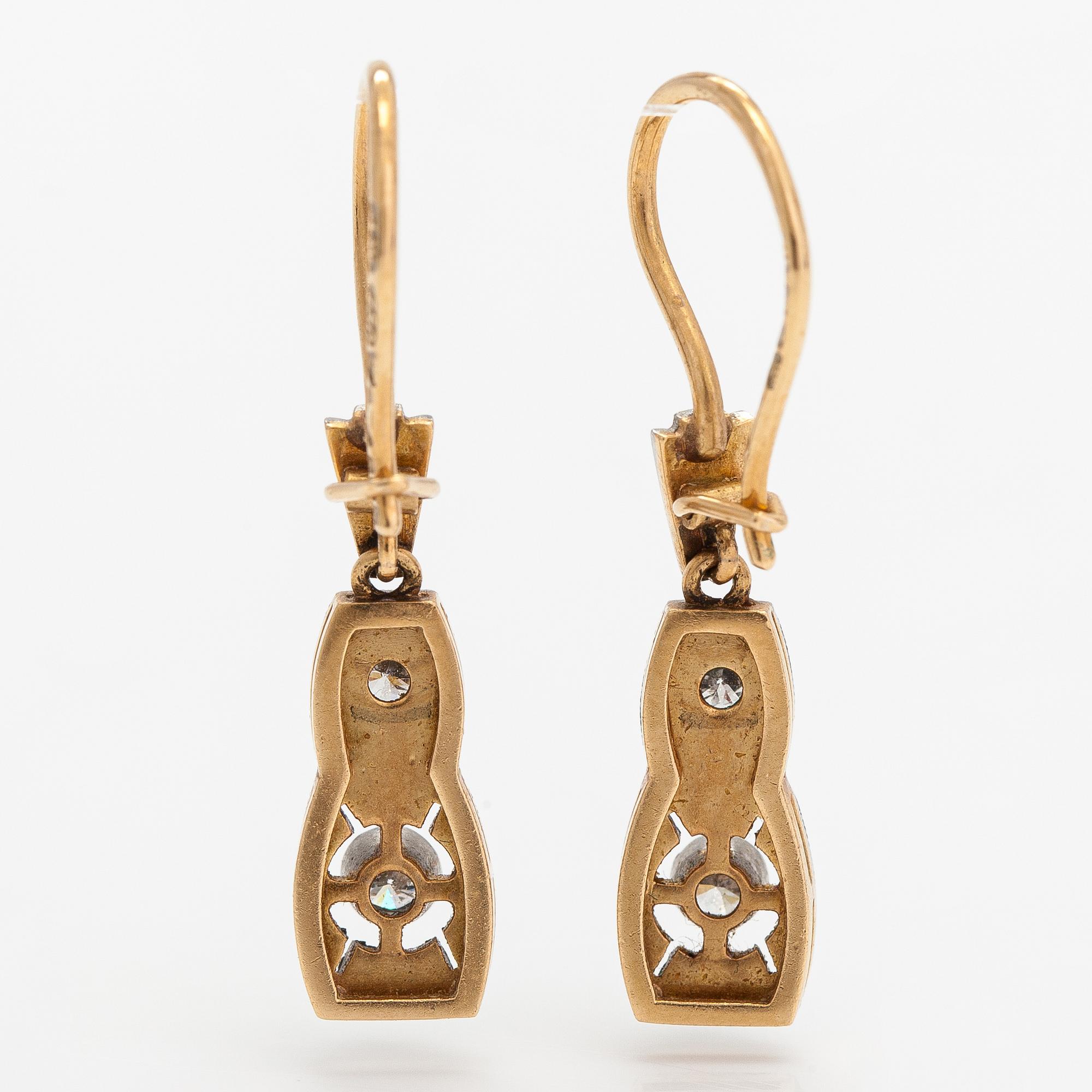 A necklace, ring and earrings, 14K gold and diamonds ca. 0.92 ct in total. Westerback, Helsinki 1964-1973.