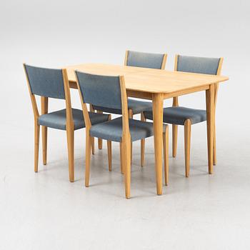 A dining table and four chairs, second half of the 20th Century.