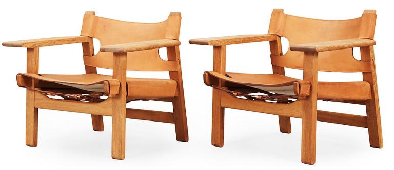 A pair of Børge Mogensen oak and leather 'Spanish chairs', Fredericia stolefabrik, Denmark.