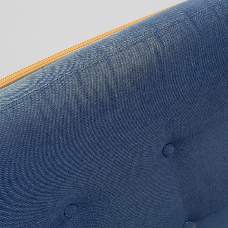 Bruno Mathsson, a pair of armchairs with ottomans, 'Ingrid', Dux, second half of the 20th century.