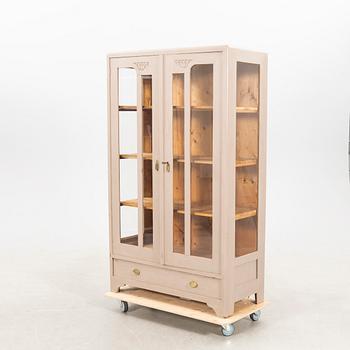 Display cabinet, early 20th century.