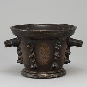 A 16th century bronze mortar.