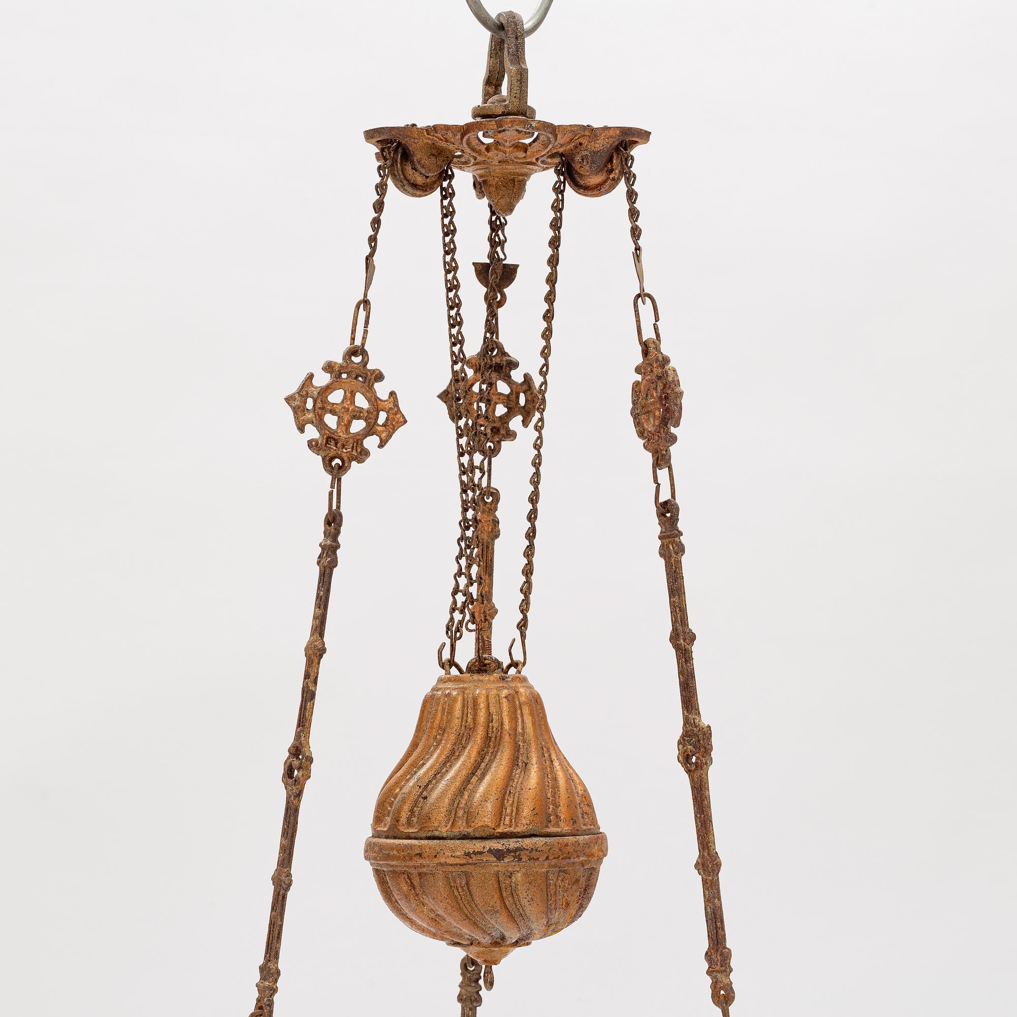 A ceiling carosene lamp, circa 1900.