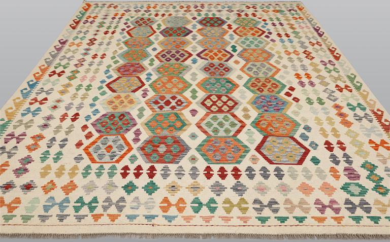 A Kilim carpet, approx. 300 x 251 cm.