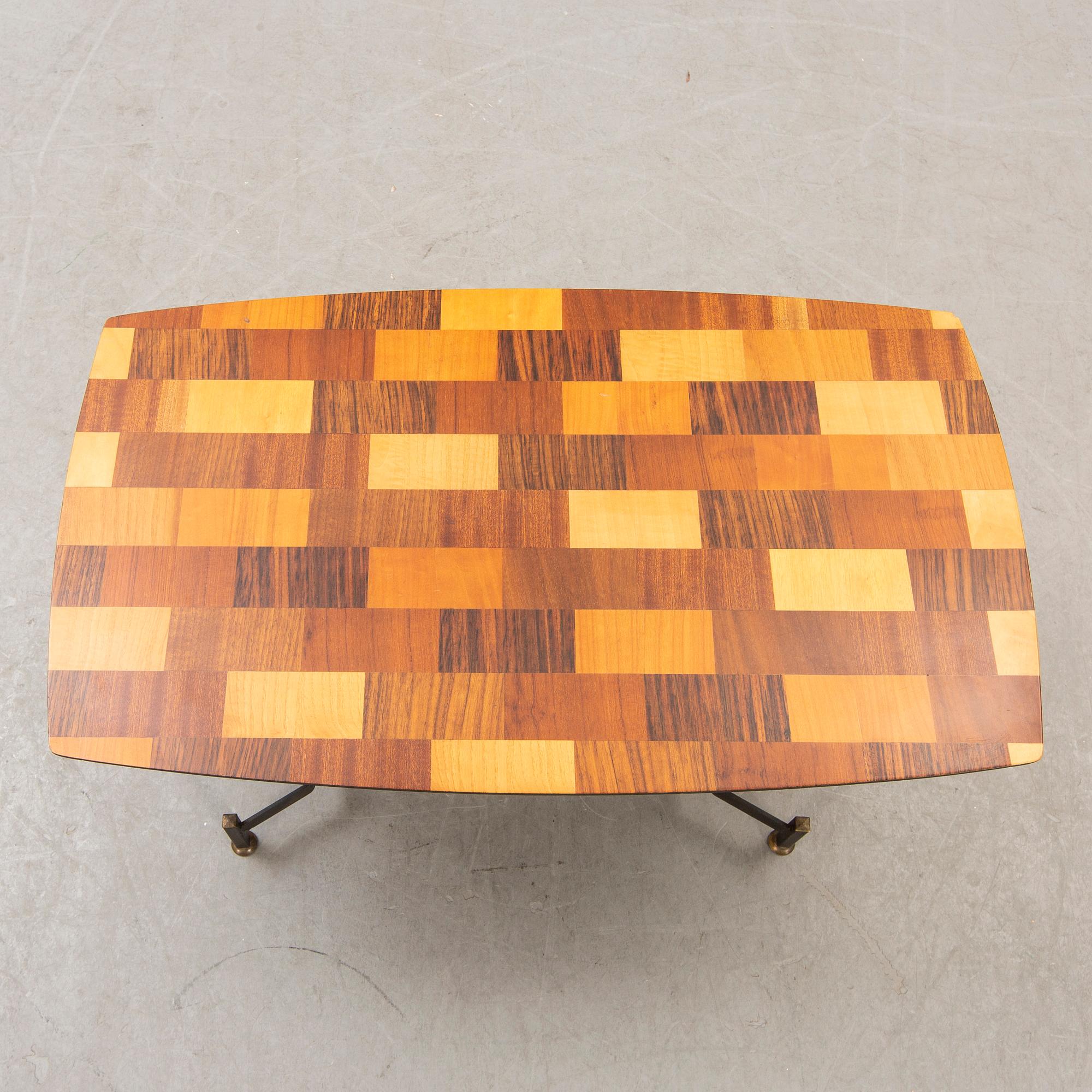 An Italian 1950s mahogany, walnut side table.