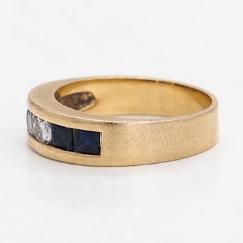 An 18K gold ring, diamonds totalling approx. 0.26 ct and sapphires. Finnish hallmarks 1999.