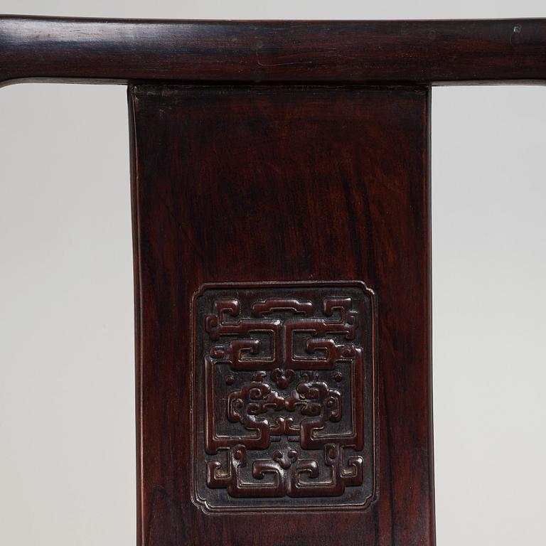 A pair of Chinese hardwood chairs, late Ming dynasty.