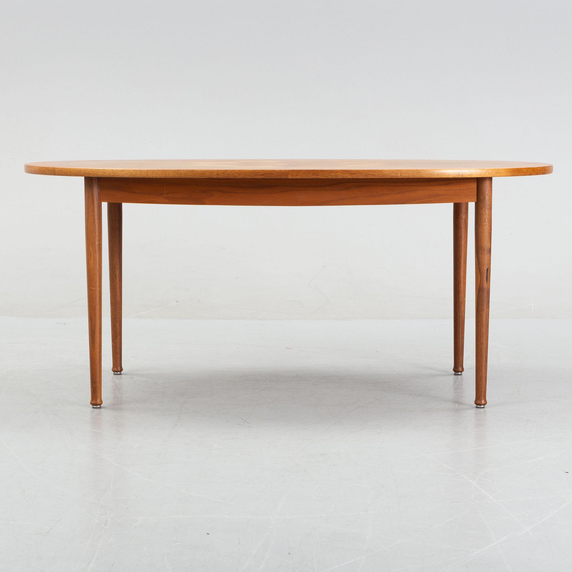 A walnut veneered coffee table from Seffle Möbelfabrik, mid 20th Century.