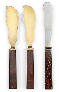 736. A pair of Swedish porphyry patties knife and a cheese knife, circa 1900.